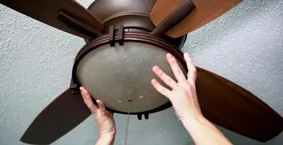 Ceiling fan repair and reinstallation on ceiling mount in Charleston, SC