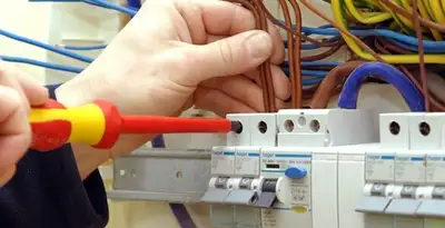 electrician services performing professional electrical panel wiring and connections in Charleston, SC