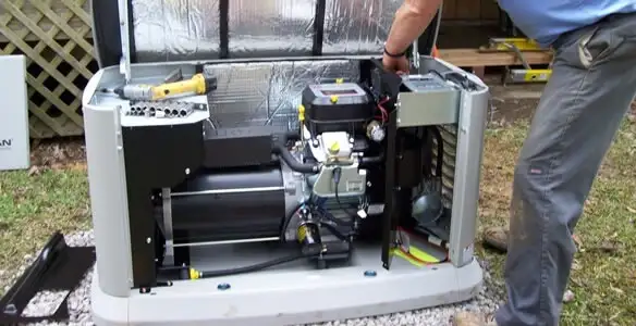 generator installation service showing technician connecting and configuring generator components in Charleston, SC