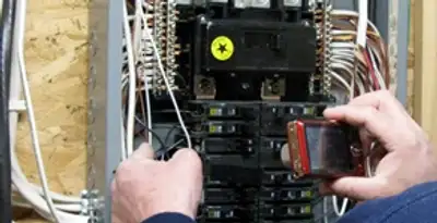 Home electrical inspection of circuit breaker panel by licensed electrician in Charleston, SC