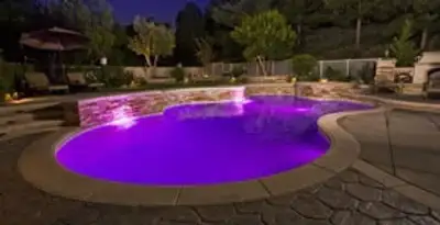 pool light installation and repair services illuminating a residential swimming pool in Charleston, SC